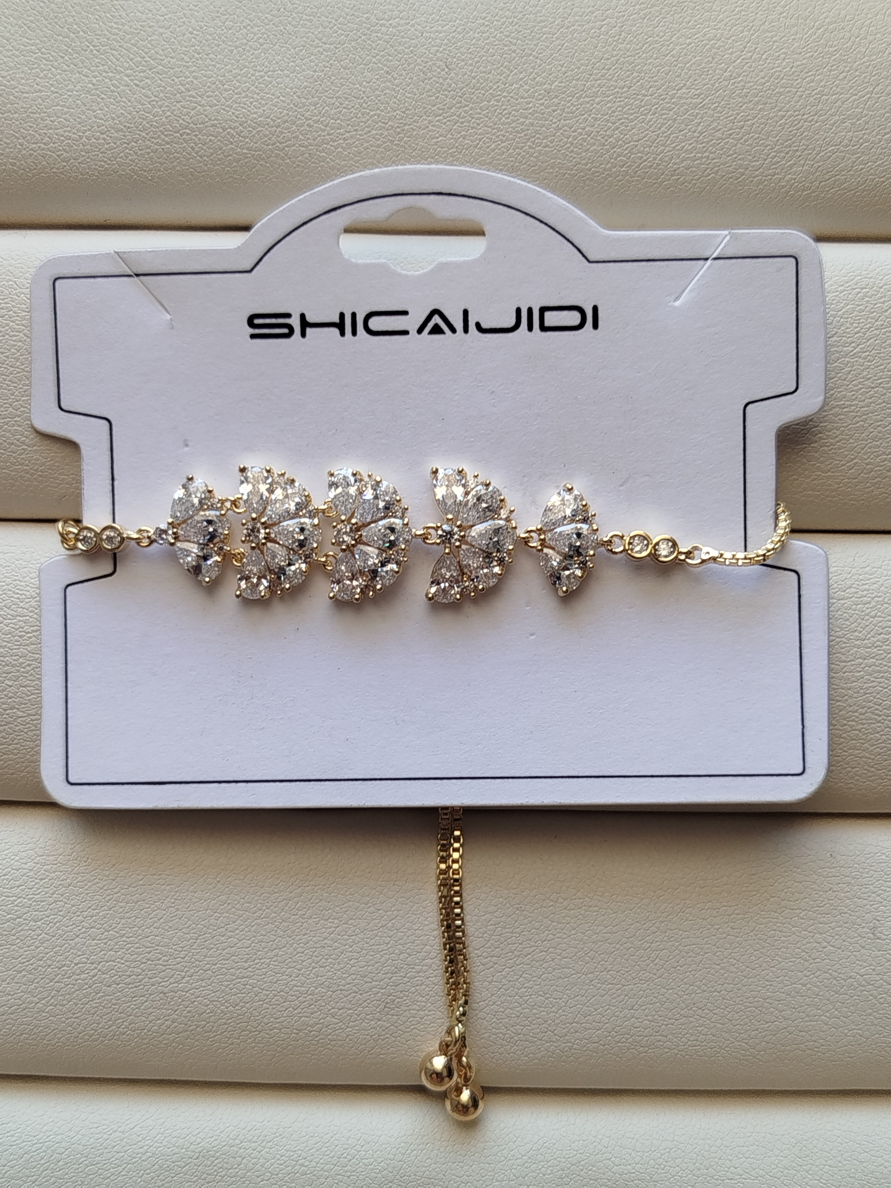 دستبند کراواتی طرح بادبزنی فول نگین کد 36